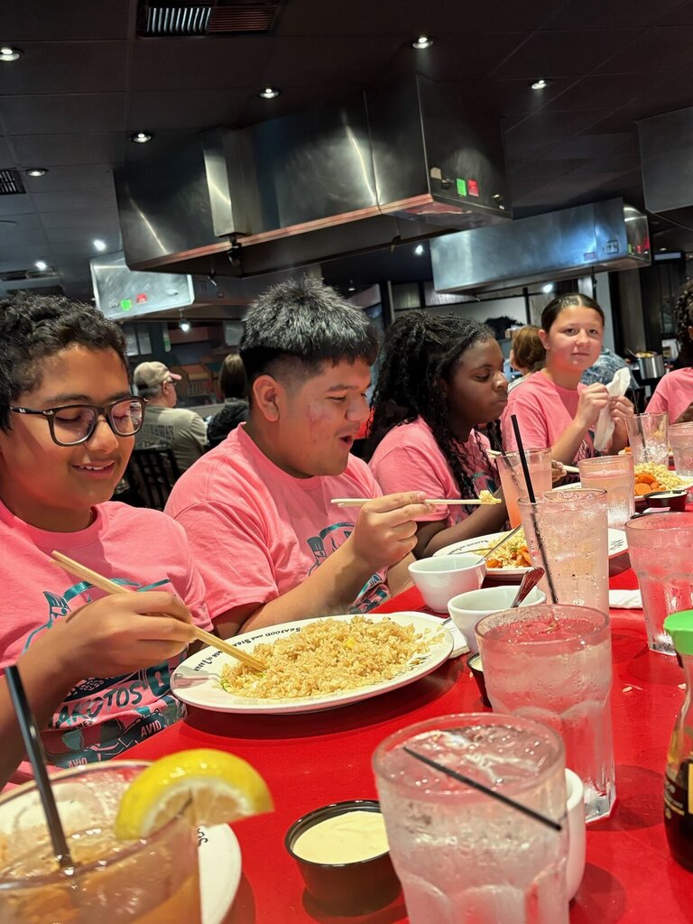 students eating at makotos