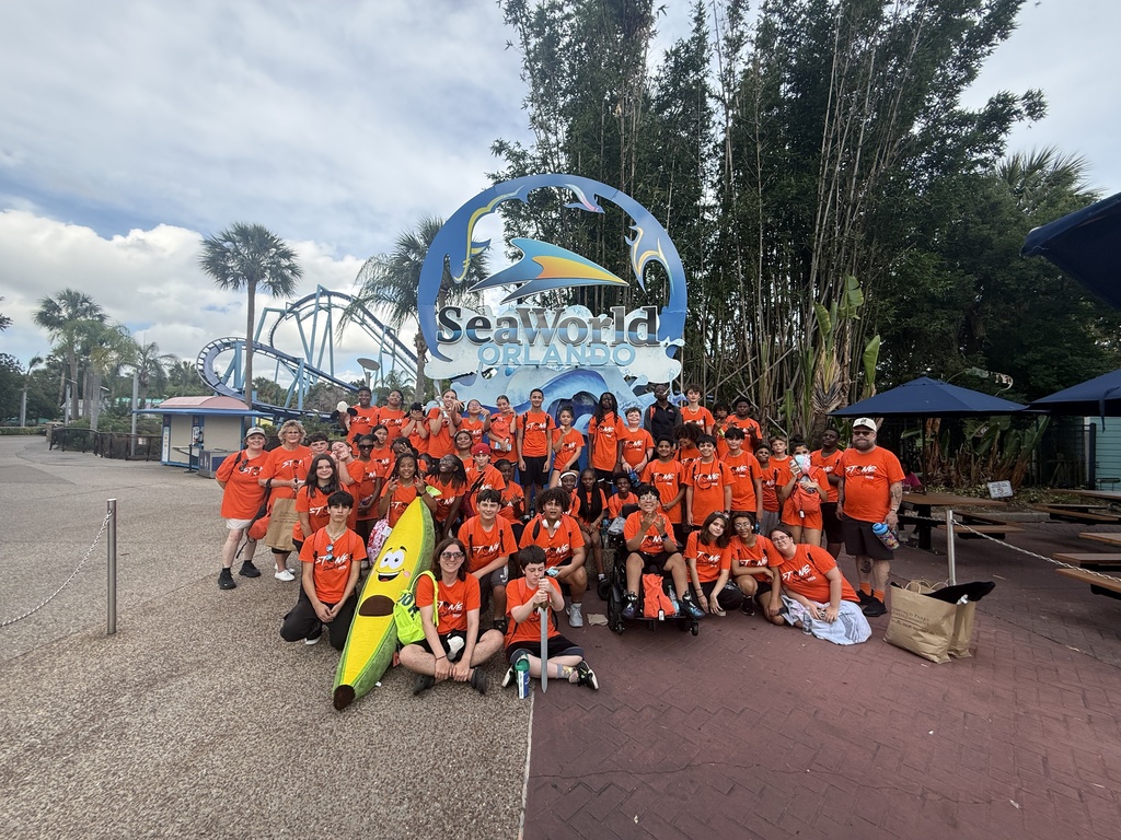 Students in front of SeaWorld sign