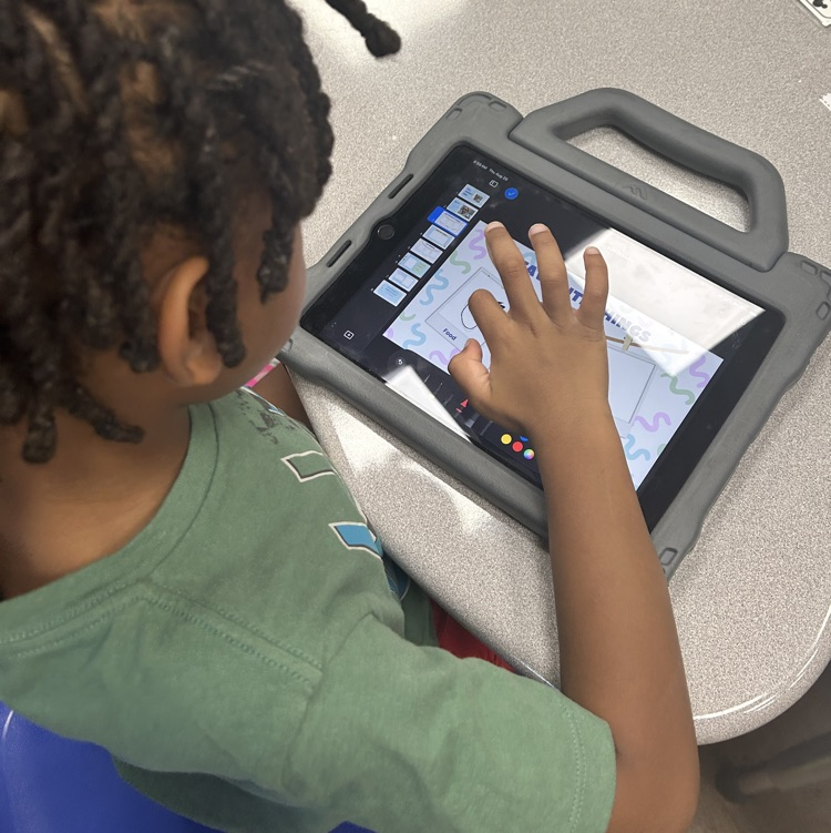 First-Grade student works on the “All About Me” lesson.