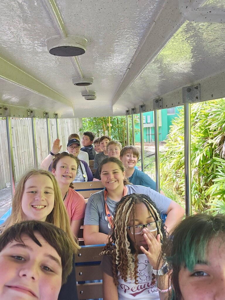 image of students on the train from the brevard zoo field trip