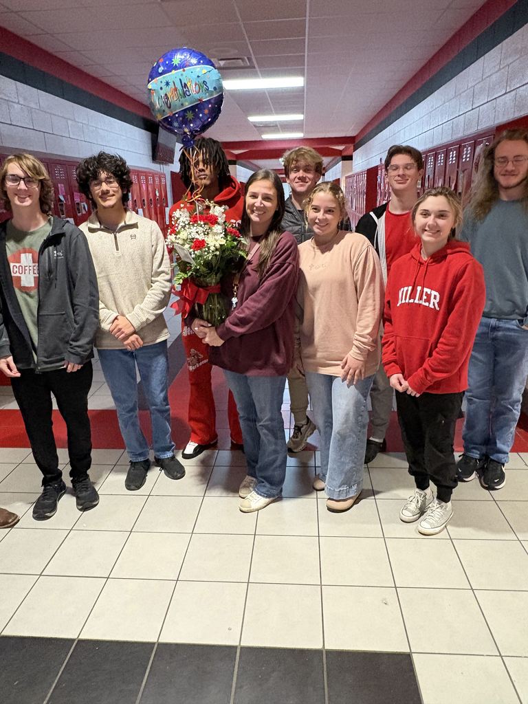 Mrs. Salter and some students. 