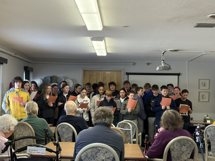 Sharing songs that were familiar with the residents.