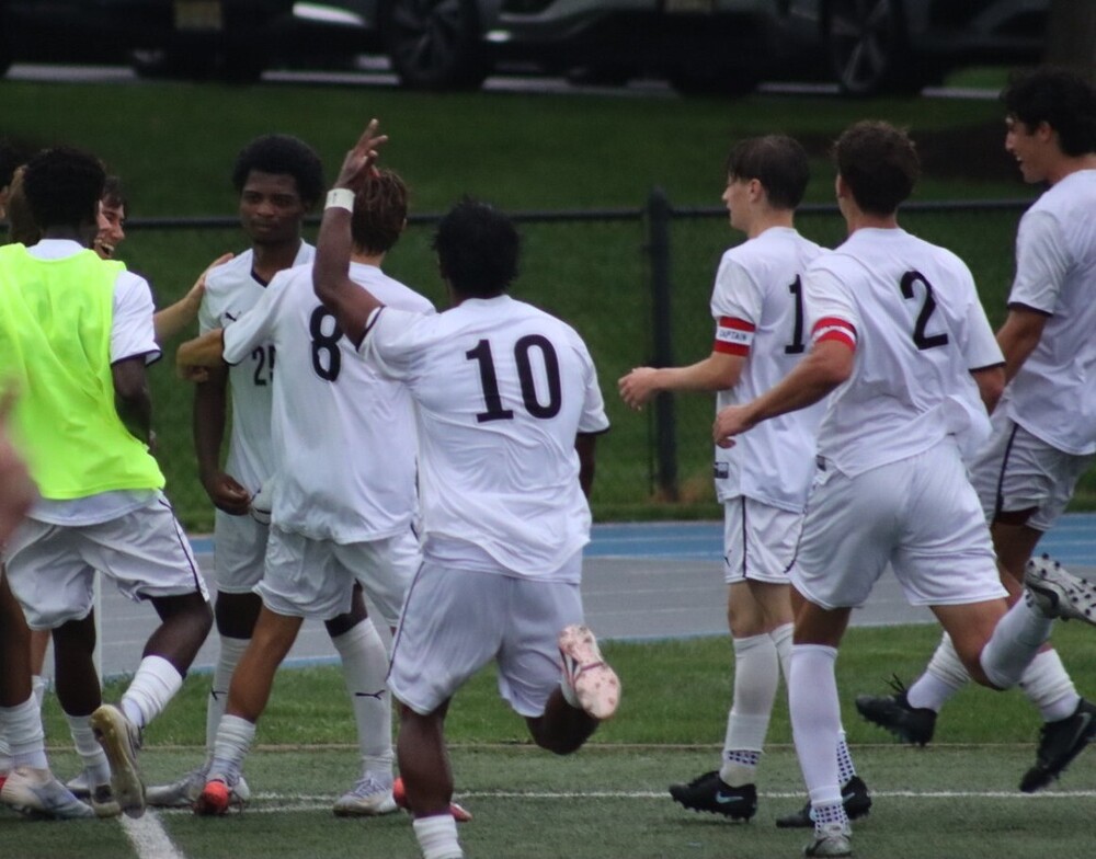 BRHS soccr team celebrates at Gill St bernard's