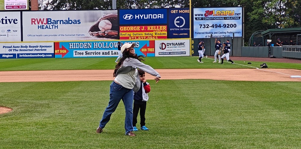 Kiran throws ou tpitch at Patriots game