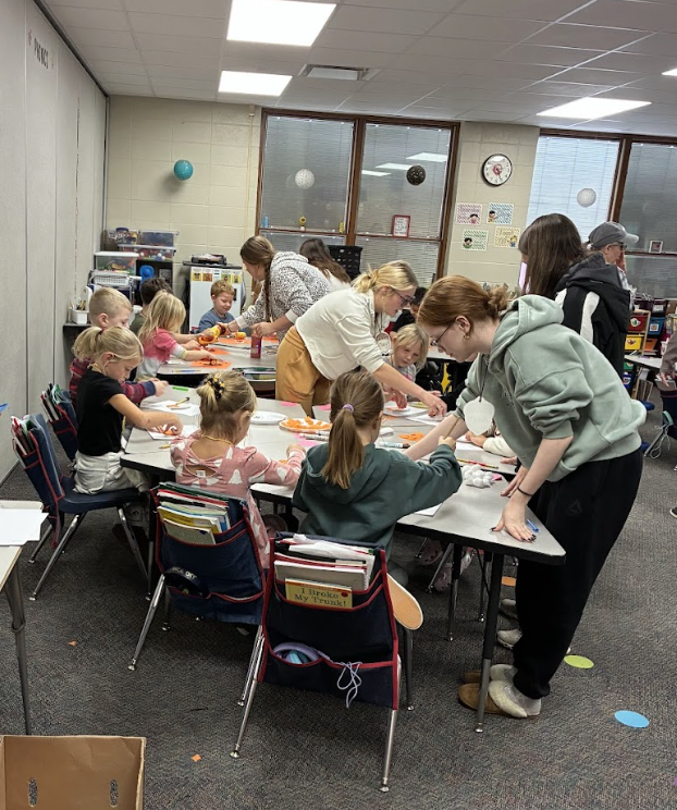 HS students working with ES students 