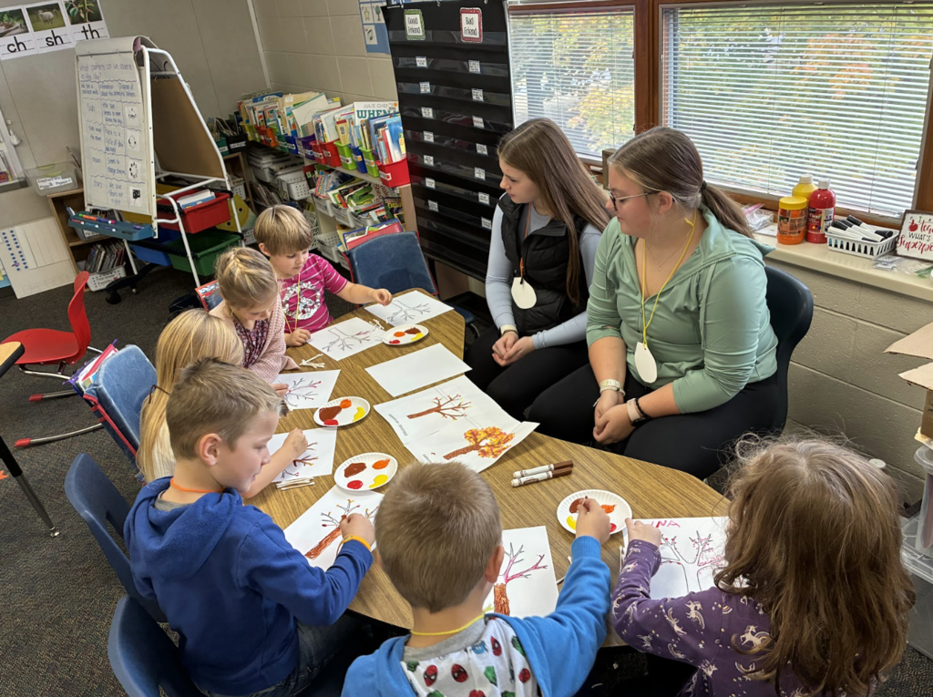 HS students working with ES students 