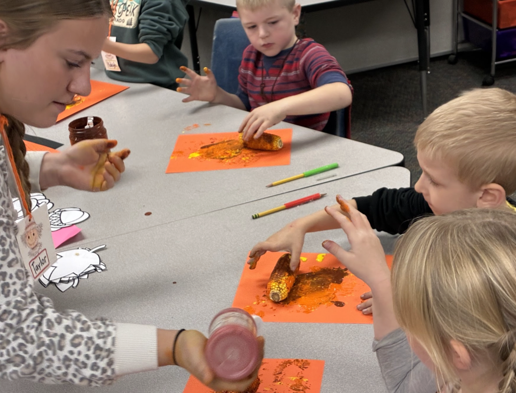 HS students working with ES students 