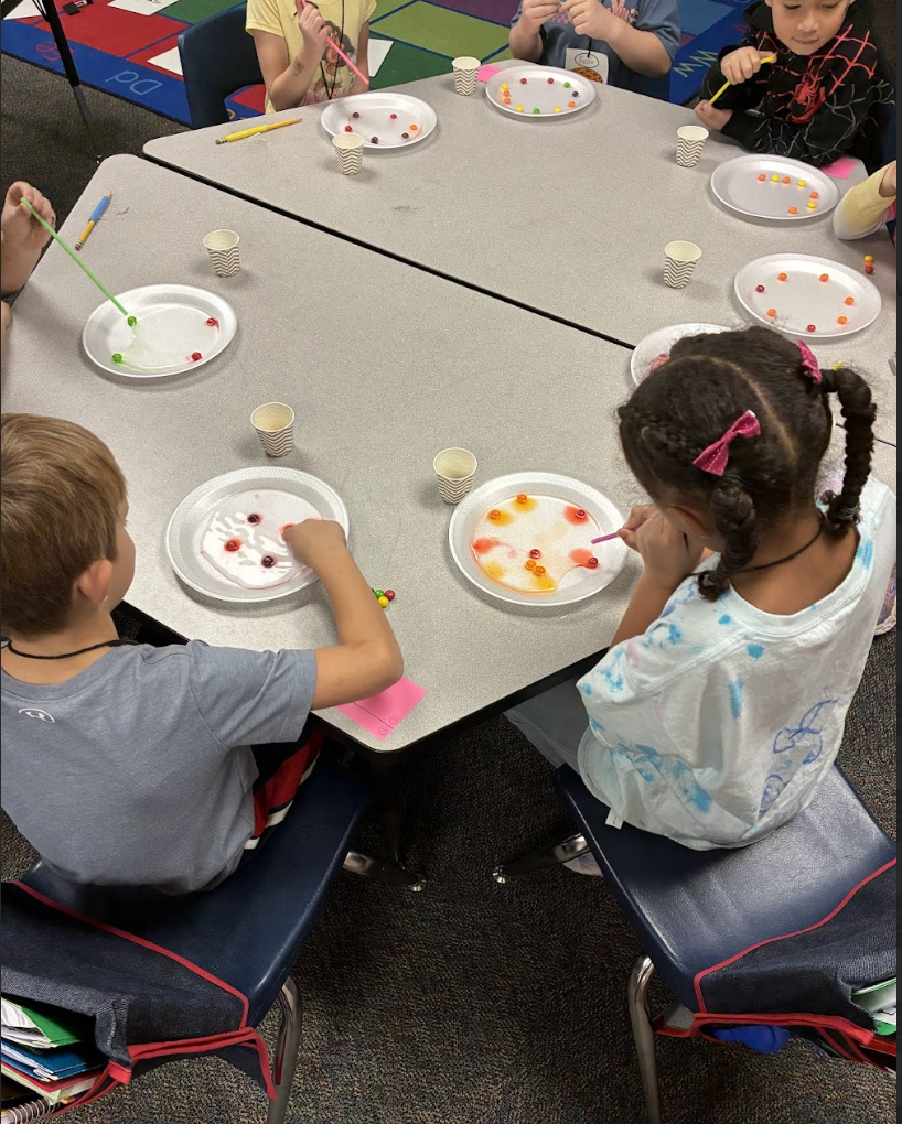 HS students working with ES students 