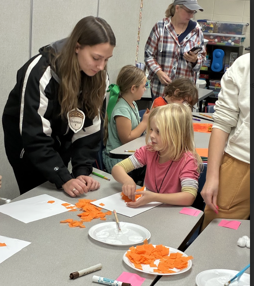 HS students working with ES students 