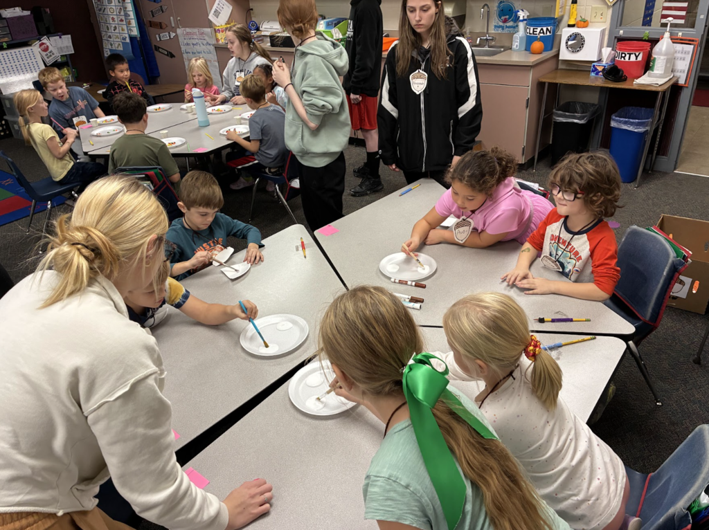 HS students working with ES students 