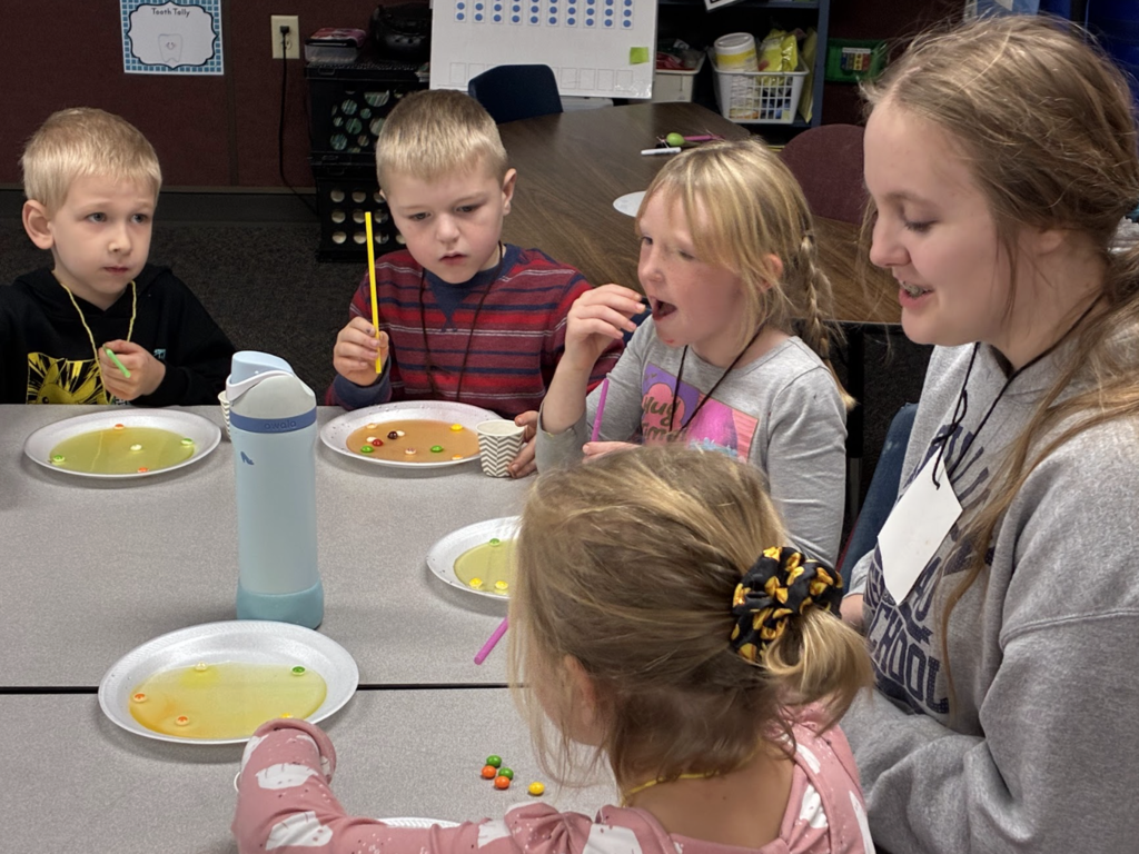 HS students working with ES students 