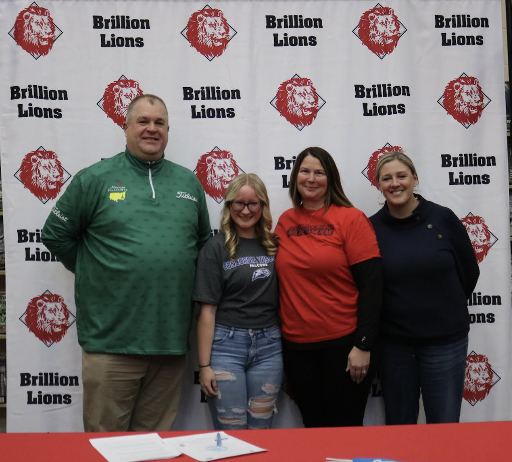 Student signing letter of intent 