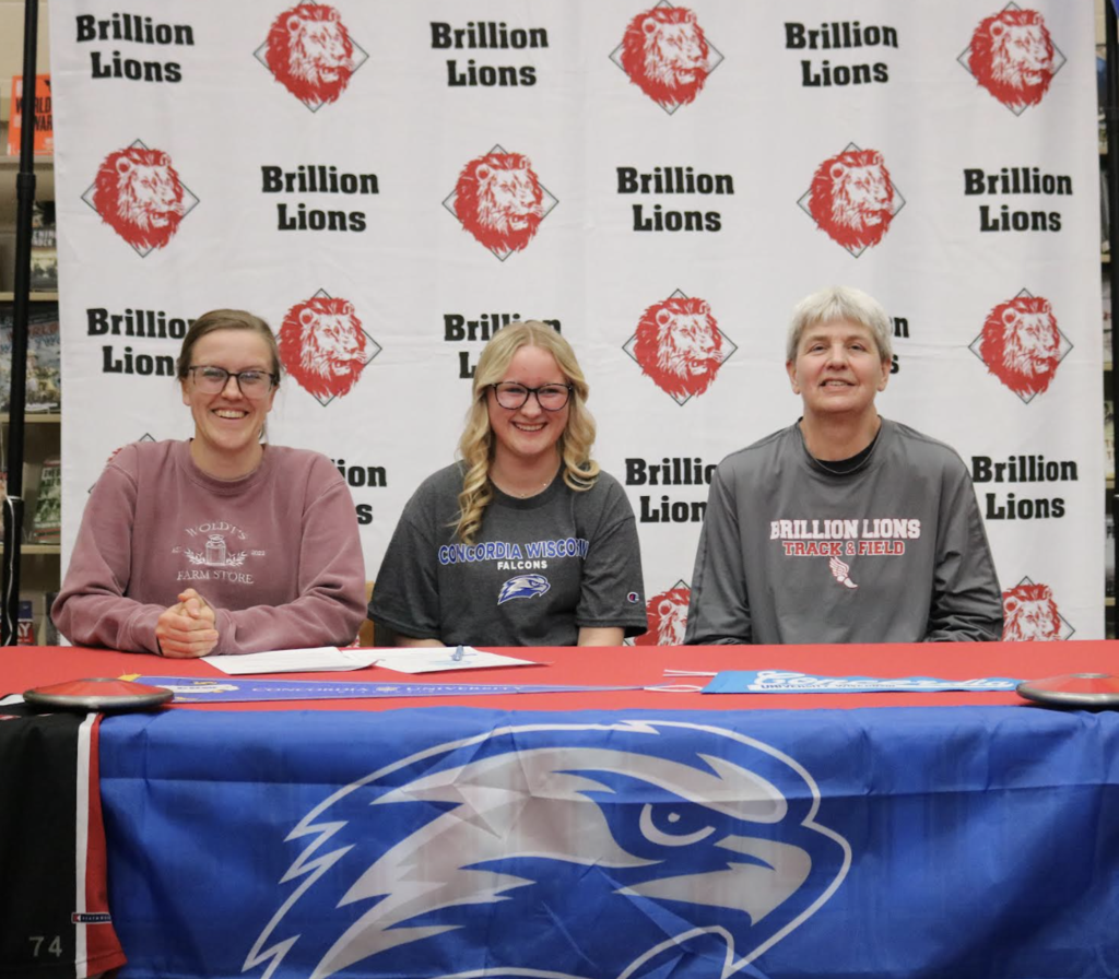 Student signing letter of intent 