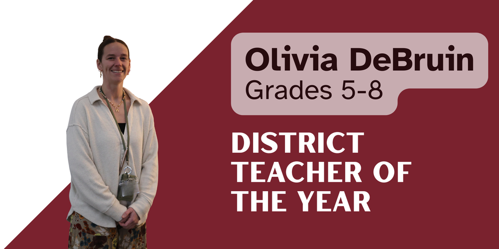 Olivia DeBruin stands smiling against a maroon and gray graphic background with text that reads “Olivia DeBruin, Grades 5–8, District Teacher of the Year.” She is wearing a light cardigan over a patterned dress and a school lanyard, posed with her hands clasped in front of her.