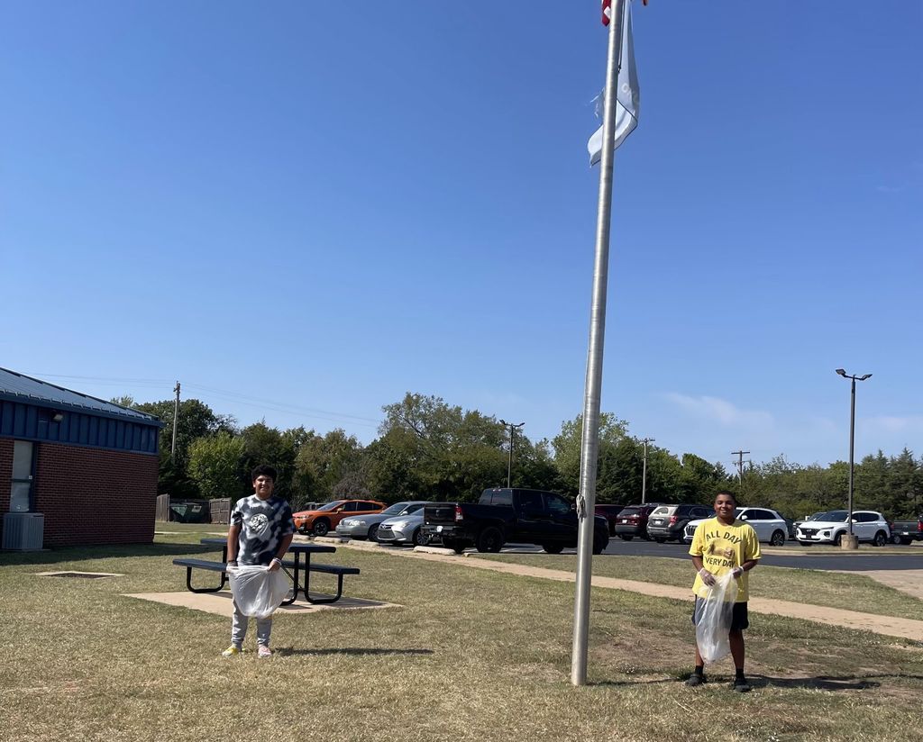 Middle School students picking up trash.