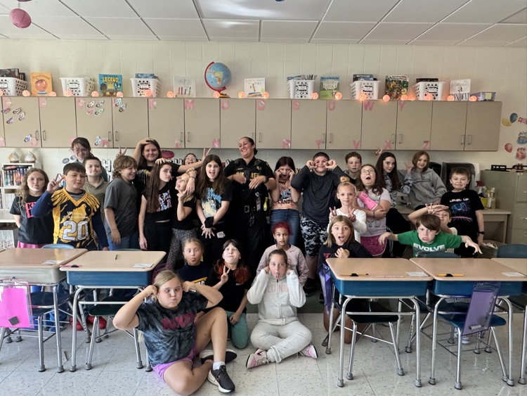 Officer Rosario teaches 5th Graders about how Kevlar protects officers while on duty.