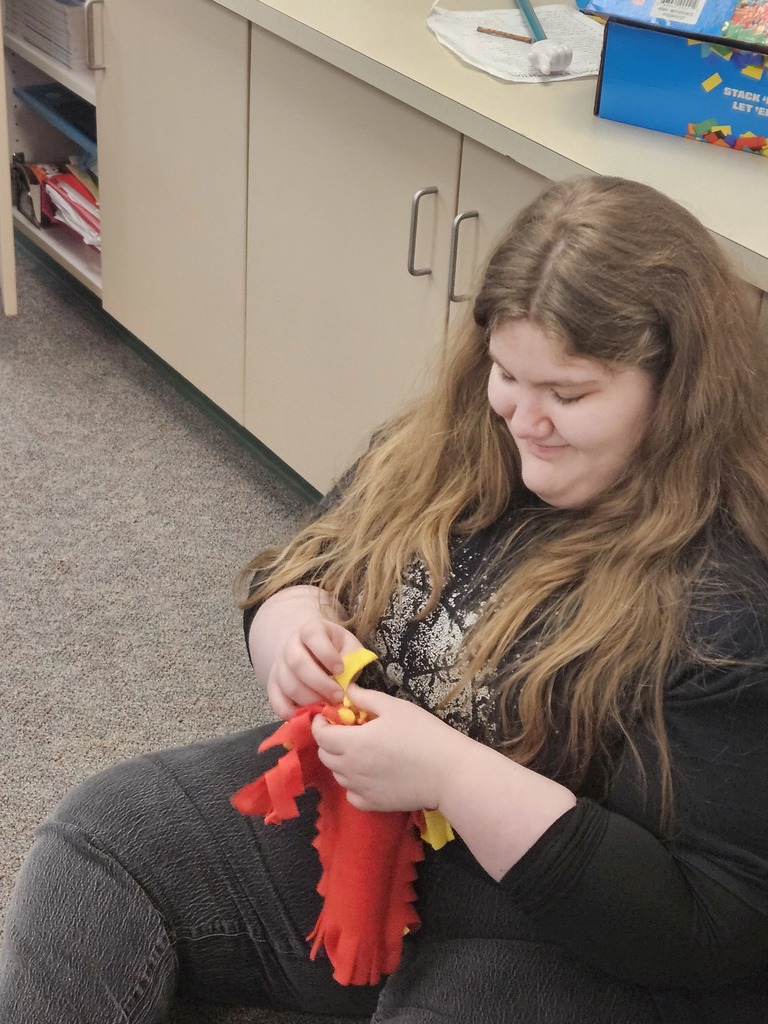 student making pillows