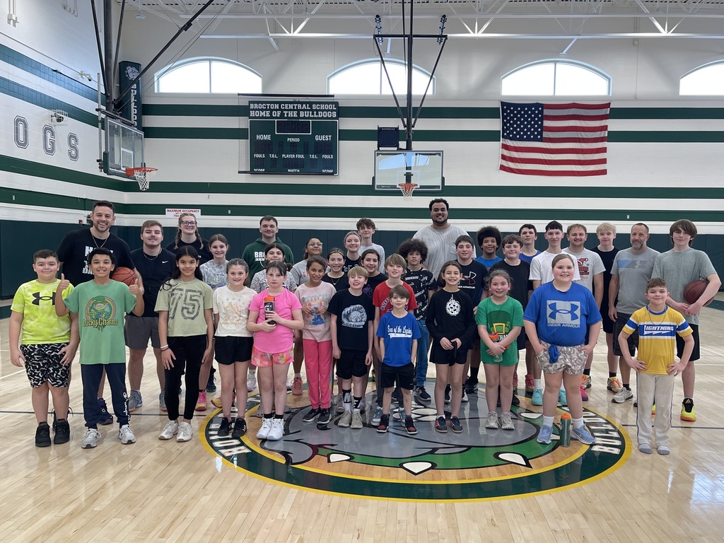Students and coaches pose for a group photo!