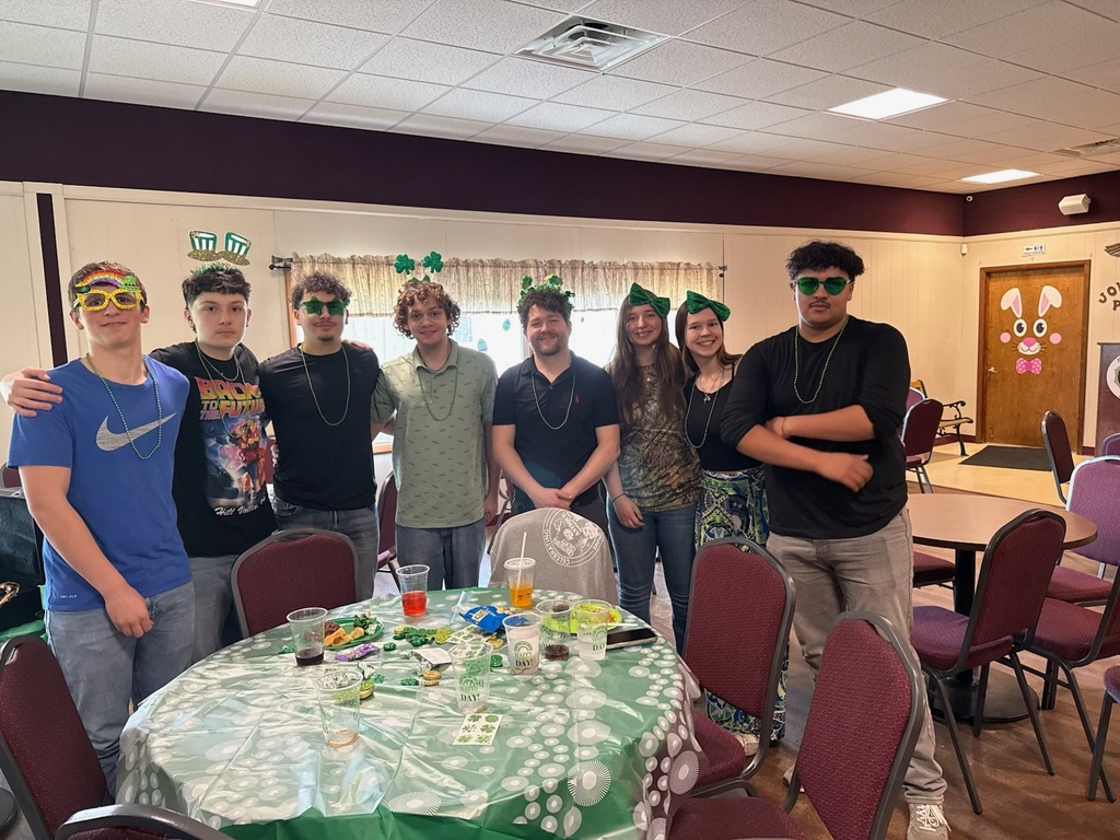 Group of High School Band Members and Director