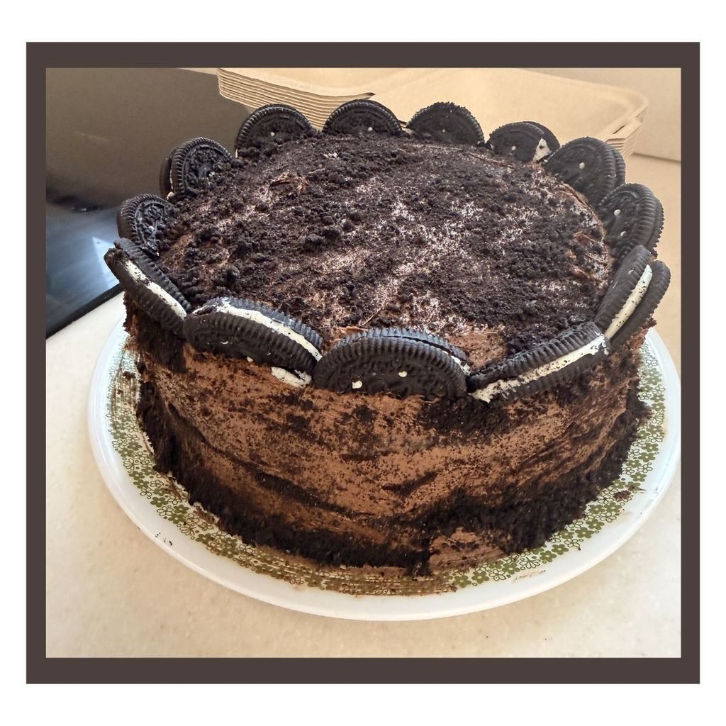 Chocolate cake covered in Oreos