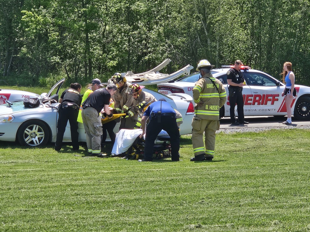 police cars, ambulance, crash scene