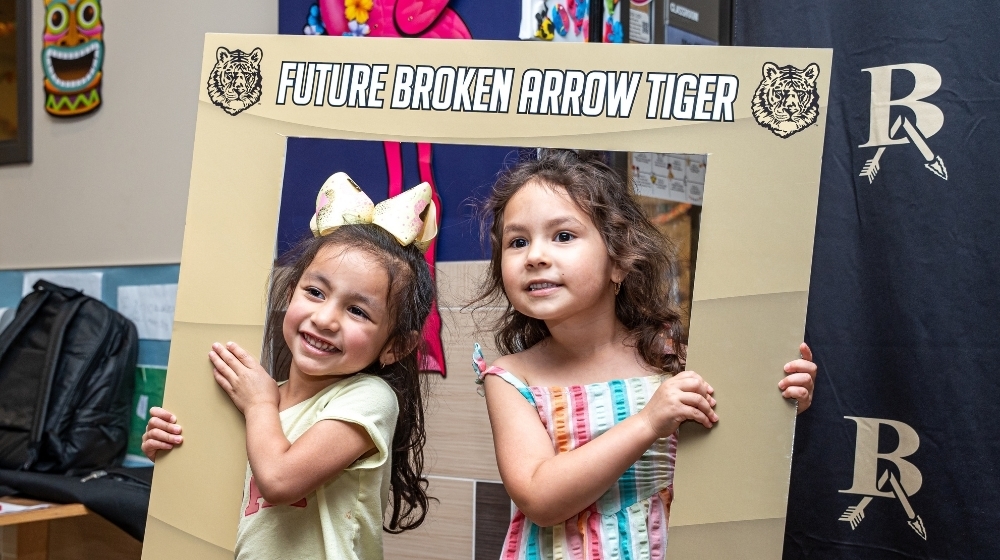 Picture of Pre-K students having their picture taken.