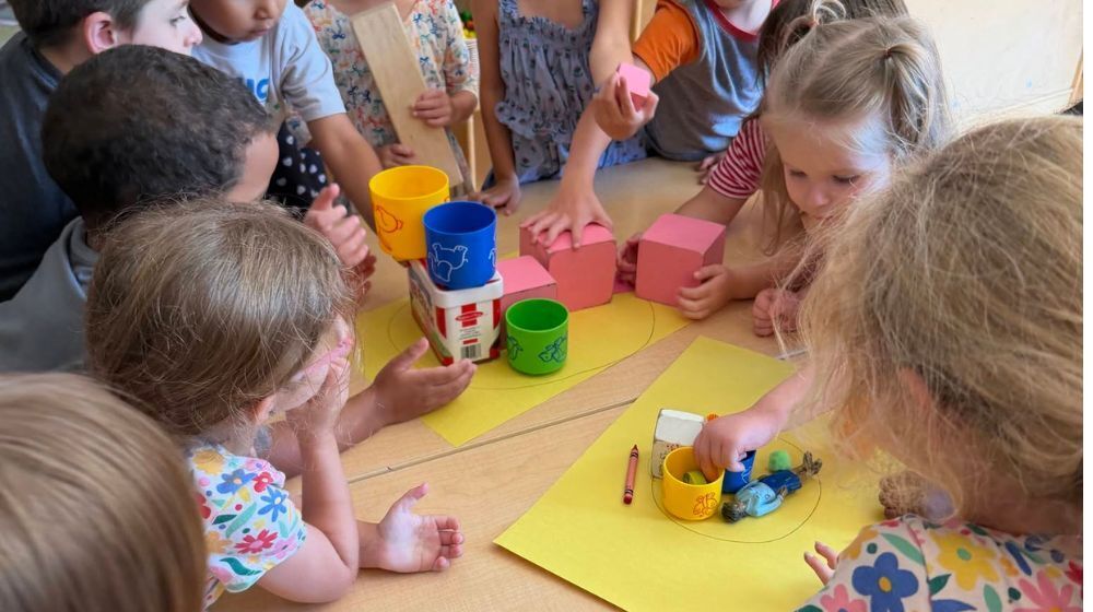 Elementary students completing a classroom assignment.
