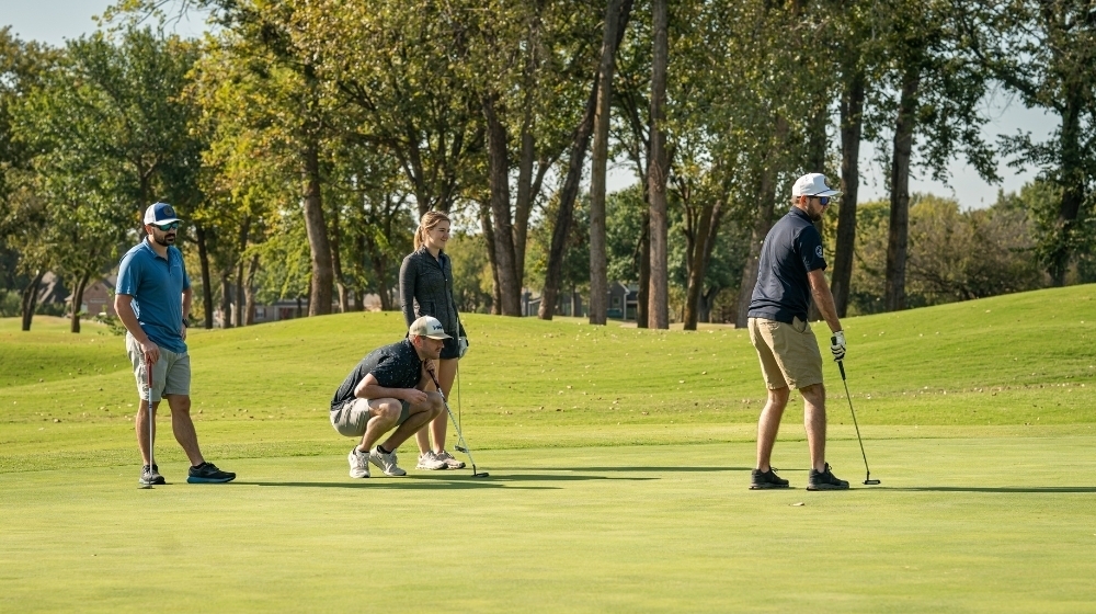 People playing golf.