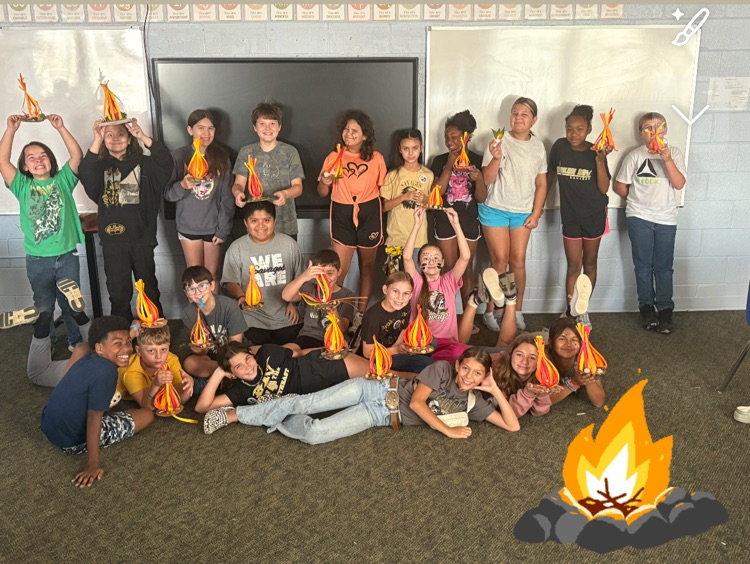 kids by campfire 