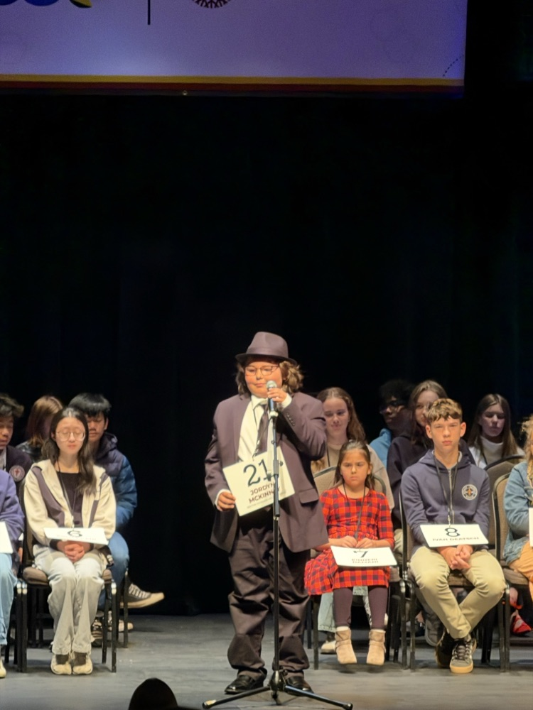 Jordan on stage at mic 