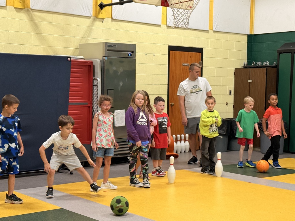 Coach and playing soccer