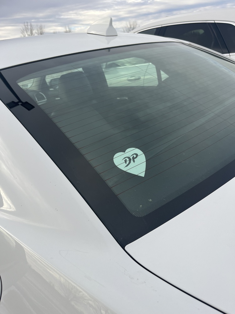 DP sticker in a car