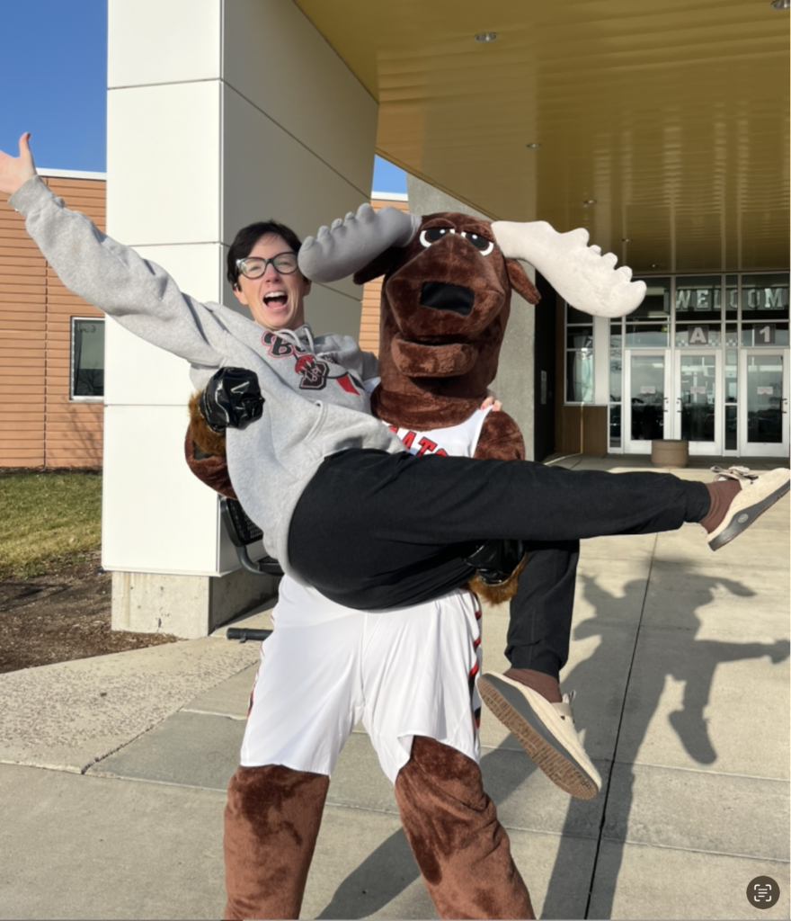 Manners moose holding the principal. 