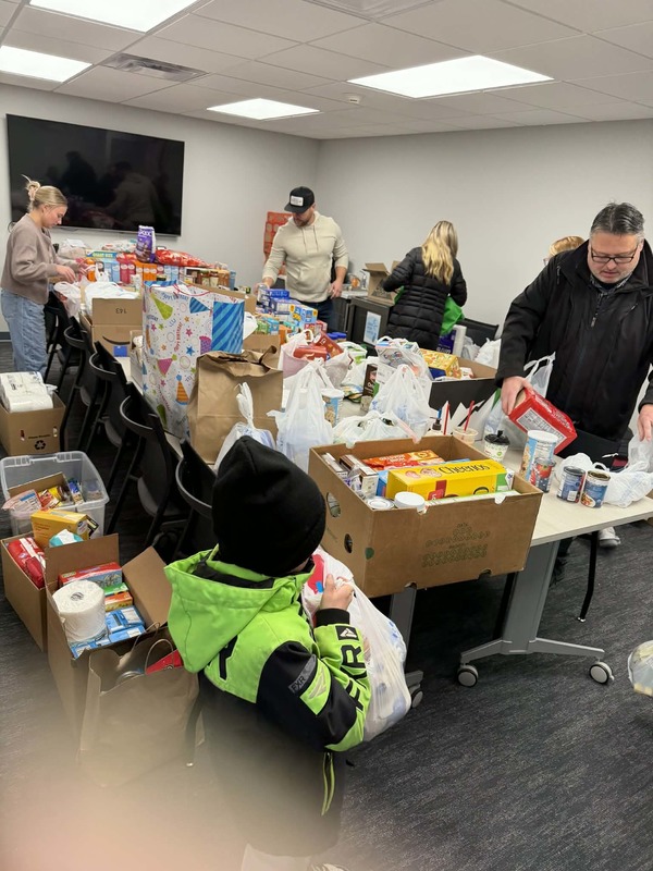 BSD and United Way staff sorting donations