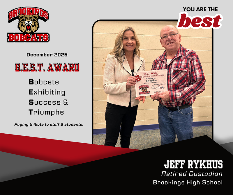 Winner Jeff, retired custodian with superintendent schultz.