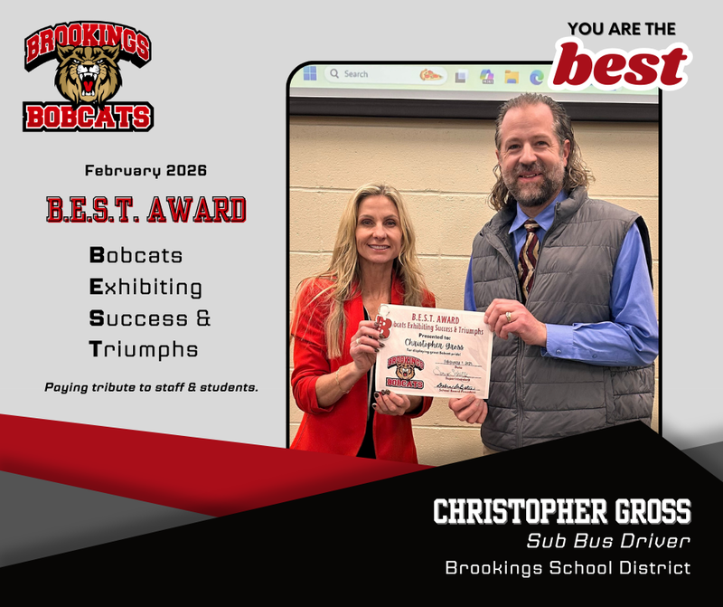 Christopher Gross, BEST award winner standing with superintendent Summer Schultz holding award certificate.