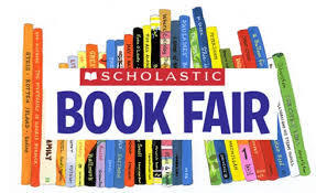 Image of books with a banner that says Scholastic Book Fair  in the front