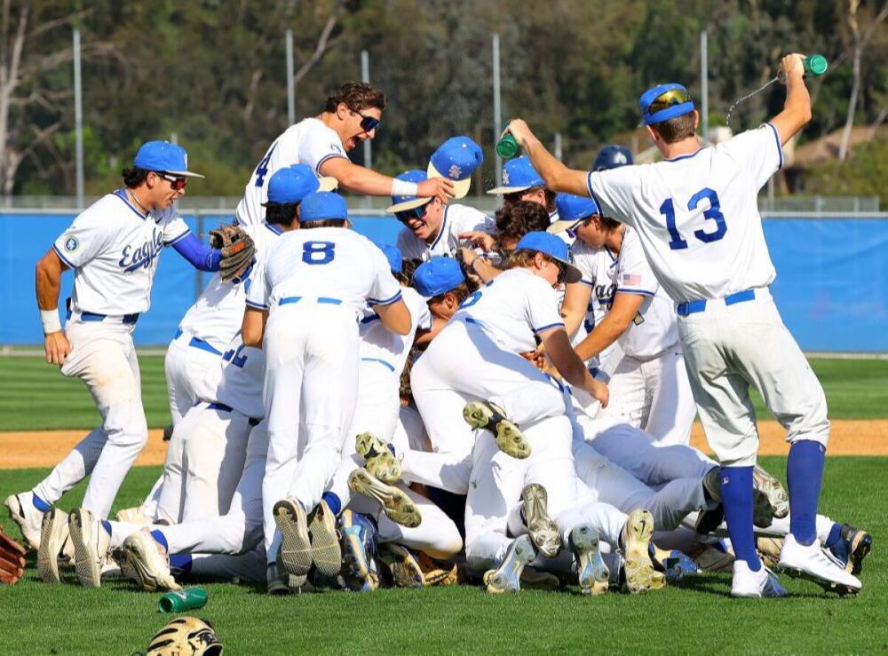 High School baseball team celebrating