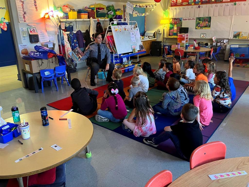 police reaching to the class