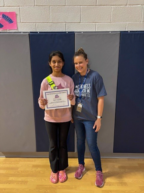 two students taking picture