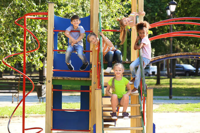 students playing on the playground at recess