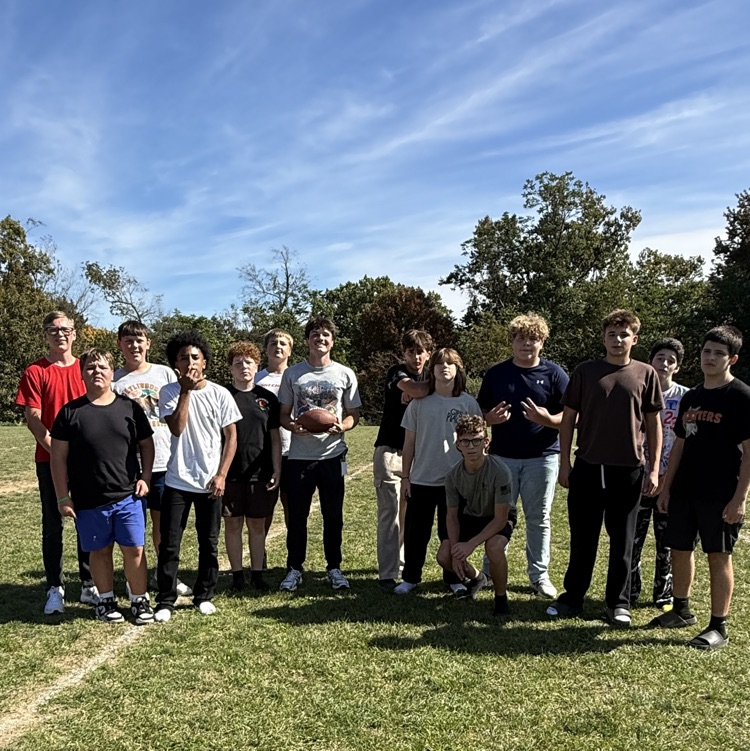 Mr. Katic playing football with the students! 