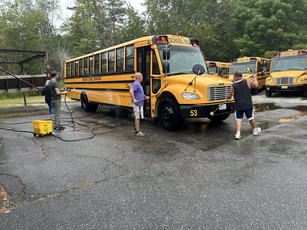 Bus Drivers Cleaning Buses