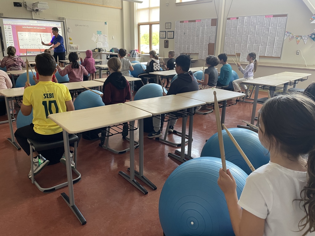 students learning drums alive