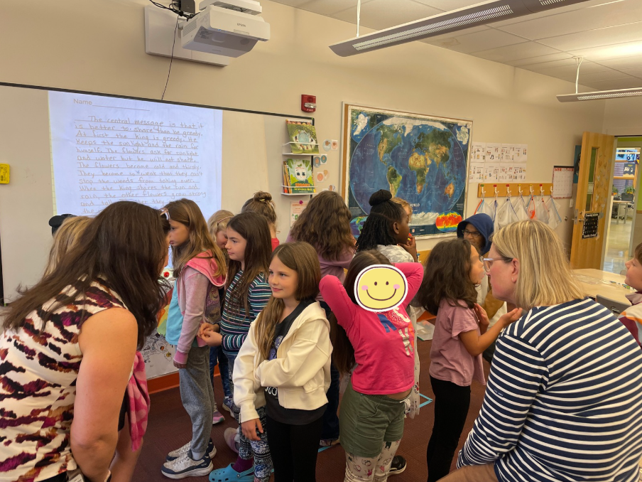 students and teachers in 2 circles talking