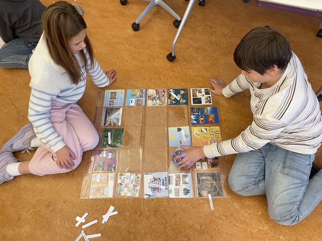 2 students coding the Bee-Bot