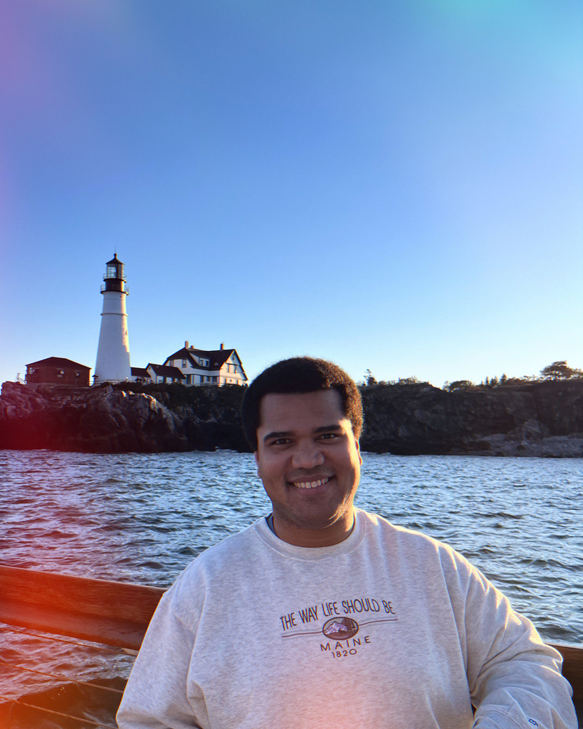 Sam Boyd in front of the Portland Head Lighthouse