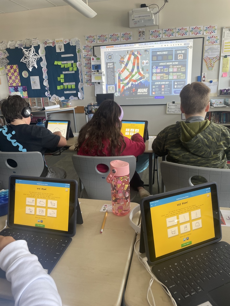 students playing Quick Draw on iPads