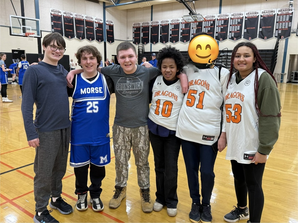 Six Brunswick Unifed athletes in uniform on the basketball court at Brunswick High School.