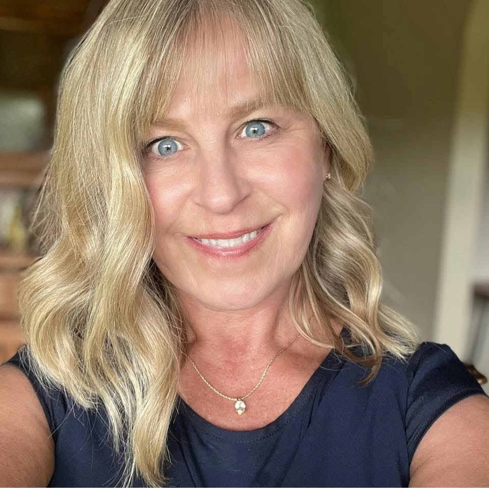 Lady taking selfie smiling